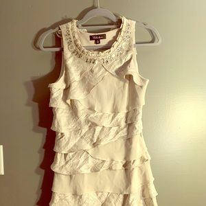 Gold dress with embellished neckline